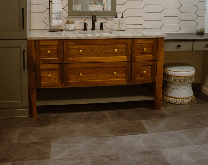 Gray tile flooring in a modern bathroom