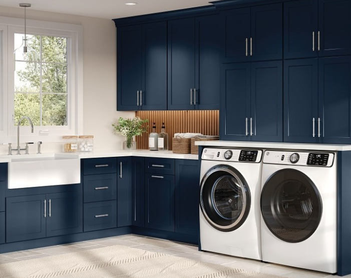 blue cabinets in a laundry room